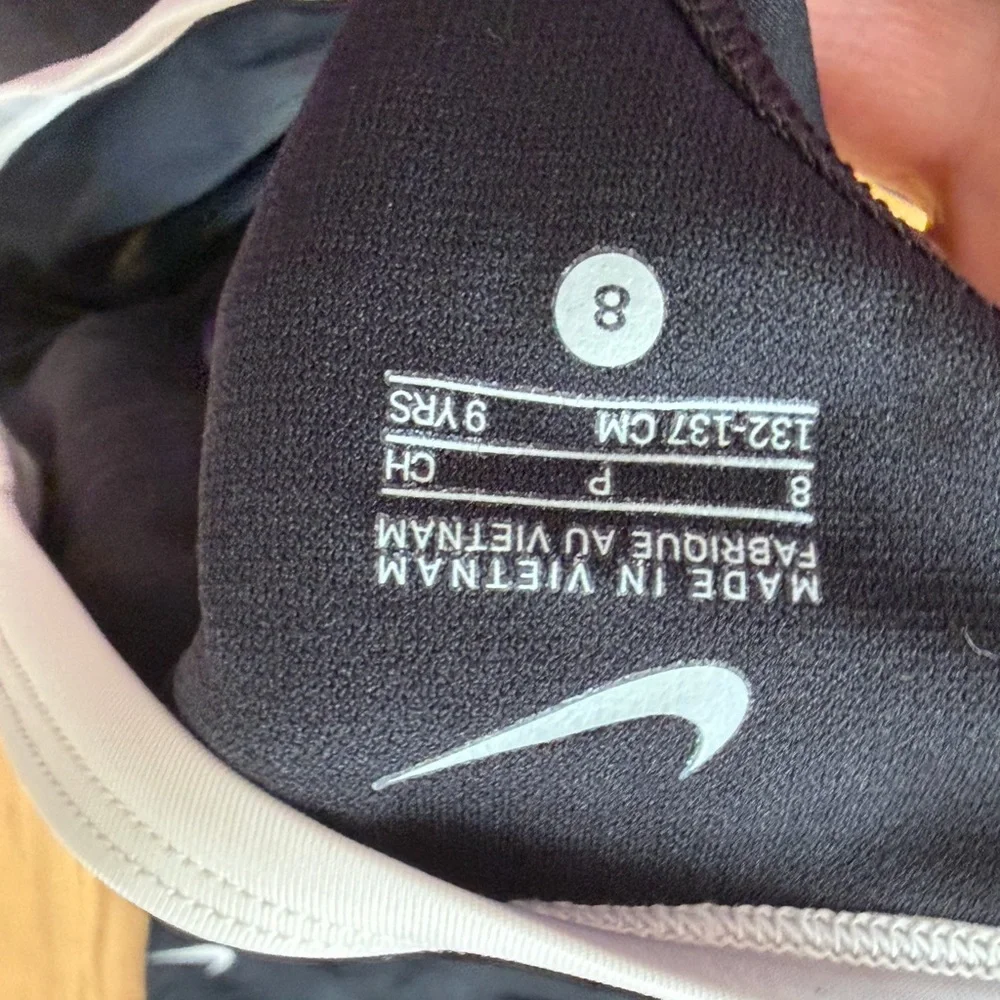 Nike Black Swim Top with White Swoosh and Trim